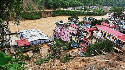 Buildings washed away in Mandi in Himachal Pradesh after torrential rains. (REUTERS) Buildings washed away in Mandi in Himachal Pradesh after torrential rains. (REUTERS)
