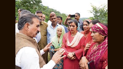 Himachal Pradesh chief minister Sukhvinder Singh Sukhu intracting with people in flood-hit Dharampur area of Mandi district on Thursday. (Birbal Sharma/HT) Himachal Pradesh chief minister Sukhvinder Singh Sukhu intracting with people in flood-hit Dharampur area of Mandi district on Thursday. (Birbal Sharma/HT)