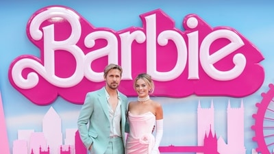 FILE - Ryan Gosling, left, and Margot Robbie pose for photographers upon arrival at the premiere of the film 'Barbie' on July 12, 2023, in London. (Scott Garfitt/Invision/AP)