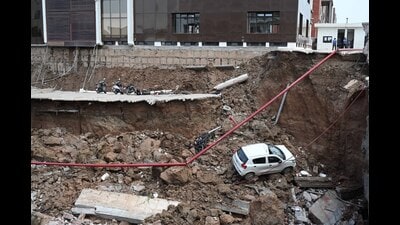 On June 14, the pavement of an adjoining building had collapsed during excavation of two plots at Sector 83, Mohali, damaging 16 vehicles. (Sanjeev Sharma/HT) On June 14, the pavement of an adjoining building had collapsed during excavation of two plots at Sector 83, Mohali, damaging 16 vehicles. (Sanjeev Sharma/HT)
