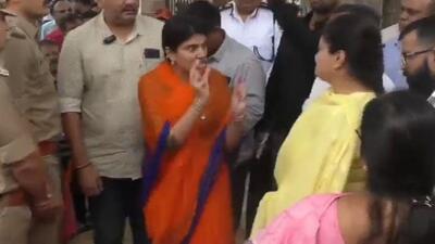 Three BJP leaders, MLA Rivaba Jadeja (left), got into a public spat with MP Poonamben Maadam (centre) and Jamnagar mayor, Bina Kothari (right) (Videograb) Three BJP leaders, MLA Rivaba Jadeja (left), got into a public spat with MP Poonamben Maadam (centre) and Jamnagar mayor, Bina Kothari (right) (Videograb)