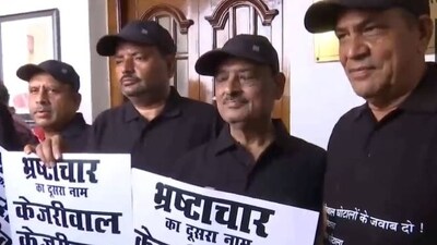 Delhi BJP MLAs protesting outside Arvind Kejriwal's office after being marshaled out of the Delhi assembly session