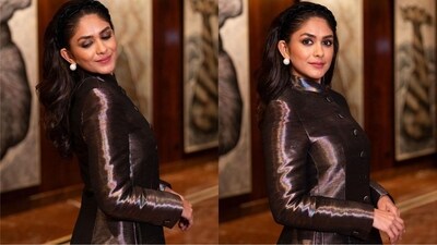 With the help of hairstylist Deepali Deokar, Mrunal kept her look minimal. She styled her look with a chic black hair band and left her hair open in soft curls. (Instagram/@mrunalthakur) With the help of hairstylist Deepali Deokar, Mrunal kept her look minimal. She styled her look with a chic black hair band and left her hair open in soft curls. (Instagram/@mrunalthakur)