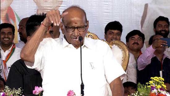 Nationalist Congress Party (NCP) chief Sharad Pawar addresses a public meeting in Beed on Thursday. (ANI)