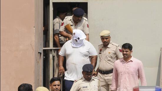 Police said they booked Bajrangi and 20 others for allegedly brandishing weapons during the Brajmandal Dharmik Yatra. (Parveen Kumar/HT Photo)