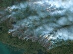 FILE PHOTO: A satellite image shows wildfires burning near Yellowknife, Northwest Territories, Canada August 16, 2023. Maxar Technologies/Handout via REUTERS/File Photo