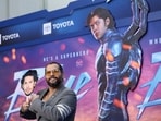 Puerto Rican-American film director Angel Manuel Soto holds a cut out of Xolo Mariduena as he attends a screening of the film Blue Beetle in Los Angeles, California, U.S., August 15, 2023.