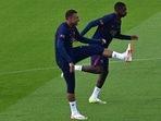 Paris Saint-Germain's forwards Kylian Mbappe and Ousmane Dembele take part in a training session Paris Saint-Germain's forwards Kylian Mbappe and Ousmane Dembele take part in a training session