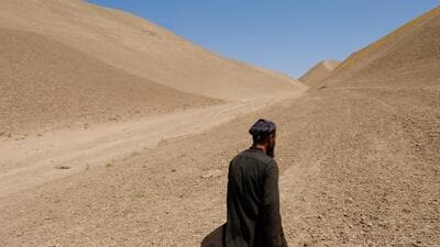 An Afghan man walks in his drought-hit wheat field in Nahr-e-Shahi district in Balkh province of Afghanistan (REUTERS FILE) An Afghan man walks in his drought-hit wheat field in Nahr-e-Shahi district in Balkh province of Afghanistan (REUTERS FILE)