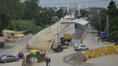 Closed entrance of the under bridge on Pakhowal road in Ludhiana inaugurated on August 14 . (Gurpreet Singh/HT)