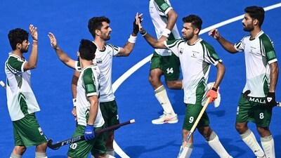 Pakistan's players celebrate after scoring a goal during the Asian Champions Trophy 2023 hockey tournament match against China (AFP)