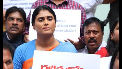 Sharmila, along with her party colleagues, sat on a day-long dharna in front of her residence and raised slogans against the state and the police. (HT Photo) Sharmila, along with her party colleagues, sat on a day-long dharna in front of her residence and raised slogans against the state and the police. (HT Photo)