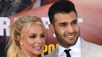 Britney Spears and Sam Asghari arrive for the premiere of Sony Pictures' "Once Upon a Time... in Hollywood" at the TCL Chinese Theatre in Hollywood, California on July 22, 2019 (Photo by VALERIE MACON / AFP) (AFP) Britney Spears and Sam Asghari arrive for the premiere of Sony Pictures' "Once Upon a Time... in Hollywood" at the TCL Chinese Theatre in Hollywood, California on July 22, 2019 (Photo by VALERIE MACON / AFP) (AFP)