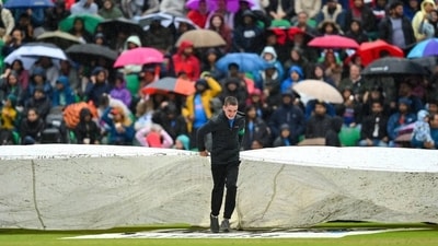 India's score was 47/2 at the time that the umpires led the players back to the dressing rooms and the ground was covered up. India were two runs ahead of th DLS par score which meant that when the umpires finally called off the match, they had taken a 1-0 lead in the series. (Getty Images) India's score was 47/2 at the time that the umpires led the players back to the dressing rooms and the ground was covered up. India were two runs ahead of th DLS par score which meant that when the umpires finally called off the match, they had taken a 1-0 lead in the series. (Getty Images)