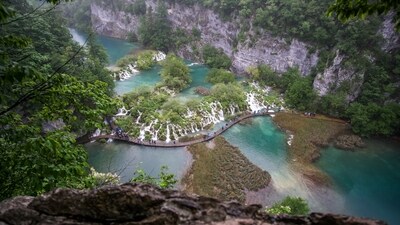 Plitvice Lakes National Park, Croatia: This stunning national park is known for its 16 crystal-clear lakes that connect to one another by a network of cascades and waterfalls. The 18 km of wooden walkways and footbridges that wind around the perimeter and across the waterfalls provide unrivalled views of the park as you explore it. Along your walk, you're also accompanied by clouds of vibrant butterflies. It is understandable why Plitvice Lakes draws up to 1,200,000 visitors annually. (Unsplash/Robert V. Ruggiero)