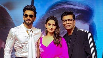 Mumbai: Actors Alia Bhatt and Ranveer Singh with filmmaker Karan Johar during a press conference of Rocky Aur Rani Kii Prem Kahaani. (PTI) Mumbai: Actors Alia Bhatt and Ranveer Singh with filmmaker Karan Johar during a press conference of Rocky Aur Rani Kii Prem Kahaani. (PTI)