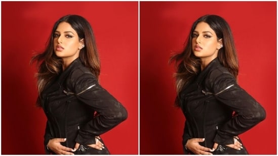 Harnaaz wore her tresses open in straight locks with a middle part and decked up in nude eyeshadow, black eyeliner, mascara-laden eyelashes, feathered eyebrows, contoured cheeks and a shade of nude lipstick as she aced the look like a diva.&nbsp;(Instagram/@harnaazsandhu_03)
