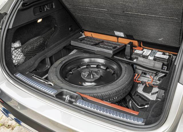 The boot is bigger too, and the spare tyre (inset) is neatly stowed under the boot floor. The boot is bigger too, and the spare tyre (inset) is neatly stowed under the boot floor.