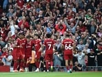 Liverpool's Diogo Jota, celebrates with teammates after scoring his sides third goal during the Premier League soccer match between Liverpool and AFC Bournemouth at Anfield Liverpool's Diogo Jota, celebrates with teammates after scoring his sides third goal during the Premier League soccer match between Liverpool and AFC Bournemouth at Anfield