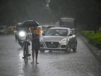 Commuters out during heavy rain at Jaswant Singh Road near India Gate in New Delhi. (Raj K Raj/ HT file) Commuters out during heavy rain at Jaswant Singh Road near India Gate in New Delhi. (Raj K Raj/ HT file)