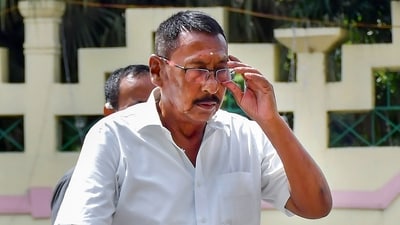 BJP leader Rajen Gohain after resigning from the cabinet rank, outside Janata Bhawan, in Guwahati, Friday. (PTI) BJP leader Rajen Gohain after resigning from the cabinet rank, outside Janata Bhawan, in Guwahati, Friday. (PTI)