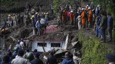 Rescuers removing debris as they search for people feared trapped after a landslide near a temple on the outskirts of Shimla on August 14. Heavy rain triggered floods and landslides in the state. (AP Photo) Rescuers removing debris as they search for people feared trapped after a landslide near a temple on the outskirts of Shimla on August 14. Heavy rain triggered floods and landslides in the state. (AP Photo)