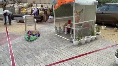 The order came after residents of Gaur City 2 on 14th Avenue, a society of 5,000 apartments, in Greater Noida West held a protest against the developer on Saturday morning after the society’s maintenance firm removed a temporary temple put up by residents from the society’s parking lot overnight. (HT Photo)