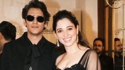 Vijay Varma and Tamannaah Bhatia pose together.