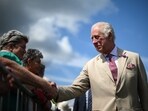 Royal Family: King Charles III reacts as he meets members of the public during a visit of the Sandringham Flower Show. Royal Family: King Charles III reacts as he meets members of the public during a visit of the Sandringham Flower Show.