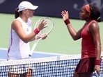 Iga Swiatek of Poland congratulates Coco Gauff after their match during the semifinals of the Western & Southern Open at Lindner Family Tennis Center on August 19