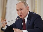 Russian president Vladimir Putin speaks during a meeting. 