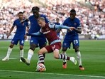 West Ham United's Jarrod Bowen in action with Chelsea's Axel Disasi and Moises Caicedo
