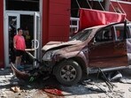 Russia-Ukraine War: A local resident stands next to a damaged car at the site of a missile strike in Chernihiv. Russia-Ukraine War: A local resident stands next to a damaged car at the site of a missile strike in Chernihiv.
