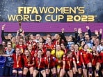 Spain's players and officials celebrate with the trophy after winning the Australia and New Zealand 2023 Women's World Cup final Spain's players and officials celebrate with the trophy after winning the Australia and New Zealand 2023 Women's World Cup final