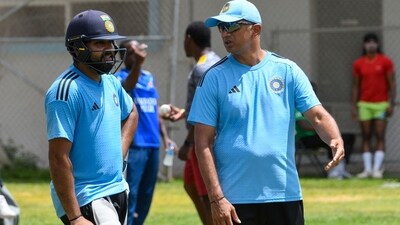 Rohit Sharma (L) and Rahul Dravid (R), of India, take part in a training session (AFP) Rohit Sharma (L) and Rahul Dravid (R), of India, take part in a training session (AFP)