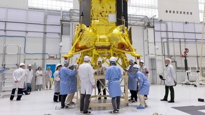 The photograph released by Russian Space Agency Roscosmos on July 13, 2023, shows the Luna-25 rover installed by technicians at the Vostochny cosmodrome, some 180 km north of Blagoveschensk, in the Amur region. (Roscosmos via AFP) The photograph released by Russian Space Agency Roscosmos on July 13, 2023, shows the Luna-25 rover installed by technicians at the Vostochny cosmodrome, some 180 km north of Blagoveschensk, in the Amur region. (Roscosmos via AFP)