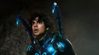 This image released by Warner Bros. Pictures shows Xolo Maridueña in a scene from "Blue Beetle." (Warner Bros. Pictures via AP) (AP) This image released by Warner Bros. Pictures shows Xolo Maridueña in a scene from "Blue Beetle." (Warner Bros. Pictures via AP) (AP)