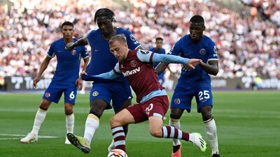 West Ham United's Jarrod Bowen in action with Chelsea's Axel Disasi and Moises Caicedo (REUTERS)