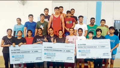 Winners of the Chandigarh Junior Wrestling Tournament at the Sports Complex on Manimajra on Sunday. (Sant Arora/HT)