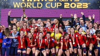 Spain's players and officials celebrate with the trophy after winning the Australia and New Zealand 2023 Women's World Cup final (AFP) Spain's players and officials celebrate with the trophy after winning the Australia and New Zealand 2023 Women's World Cup final (AFP)