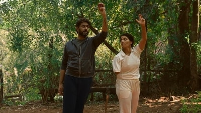 Abhishek Bachchan and Saiyami Kher in a still from Ghoomer. Abhishek Bachchan and Saiyami Kher in a still from Ghoomer.