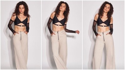 Taapsee Pannu for her recent look got decked up in a quirky black bralette top and beige pants. (Instagram/@taapsee) Taapsee Pannu for her recent look got decked up in a quirky black bralette top and beige pants. (Instagram/@taapsee)