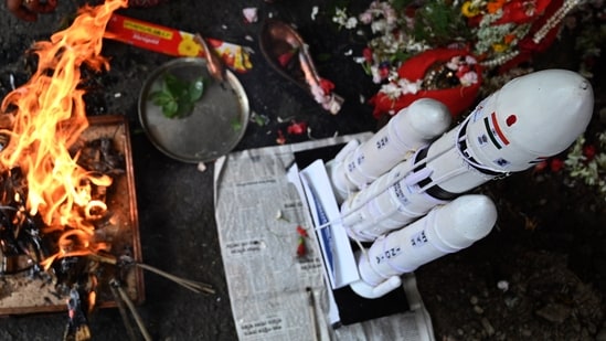 Chandrayaan 3 news: A priest performed puja rituals and prayed for success of India's Moon Mission Chandrayan-3 ahead of Vikram Landing on the Moon with a model of Indian Space Research Organization (ISRO)'s Lunar Spacecraft during Khuti Puja, a ritual to initiate Durga Puja festival at Shyambazar Pally Sangha in Kolkata on Sunday, August 20. Chandrayaan 3 news: A priest performed puja rituals and prayed for success of India's Moon Mission Chandrayan-3 ahead of Vikram Landing on the Moon with a model of Indian Space Research Organization (ISRO)'s Lunar Spacecraft during Khuti Puja, a ritual to initiate Durga Puja festival at Shyambazar Pally Sangha in Kolkata on Sunday, August 20.
