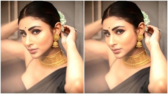 Mouni further accessorised her look for the day in a traditional golden neck choker and golden jhumkas from the house of Amnol Jewellers.&nbsp;(Instagram/@imouniroy)