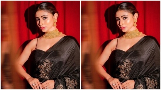 Mouni played muse to fashion designer house Auruhfy and picked a black silk saree from the shelves of the designer house.&nbsp;(Instagram/@imouniroy)