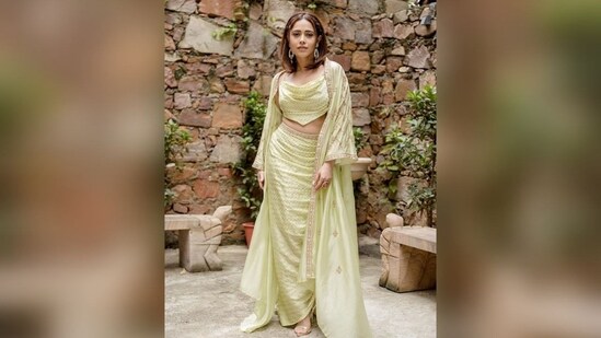 For her stunning look, Nushrratt picked up a three-piece ethnic set from the shelves of ace fashion designer Punit Balana, which comes with a hefty price tag of <span class='webrupee'>₹</span>47,500.(Instagram/@nushrrattbharuccha)