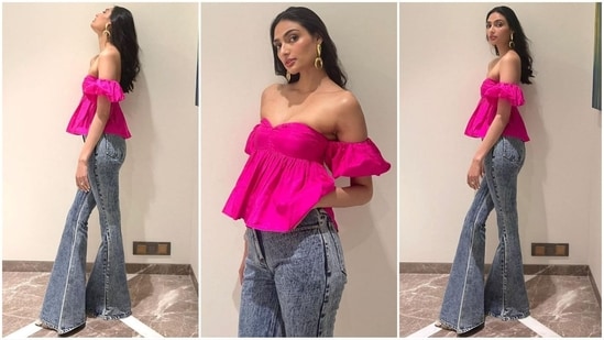 Athiya Shetty for her latest look dons a bright pink off shoulder top and stylish denim. (Instagram/@stylebyami)