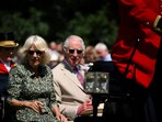 Britain's King Charles III and Queen Camilla arrive by horse drawn carriage for a visit to the Sandringham Flower Show. Britain's King Charles III and Queen Camilla arrive by horse drawn carriage for a visit to the Sandringham Flower Show.