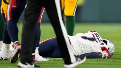 (FILES) Isaiah Bolden, #7 of the New England Patriots, lays on the field after being injured in the fourth quarter (AFP) (FILES) Isaiah Bolden, #7 of the New England Patriots, lays on the field after being injured in the fourth quarter (AFP)
