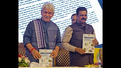 J&K Lt. Governor Manoj Sinha and Union Minister of State for Panchayat Raj Moreshwar Patil launch the 'Meri Panchayat App' during the inauguration of the three-day national workshop on 'Panchayat with Good Governance', at SKICC in Srinagar on Monday. (PTI)